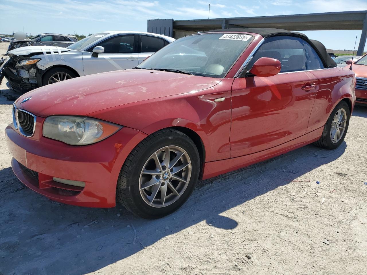2011 BMW 1er VIN WBAUL7C58BVM79666 - Copart auction photo