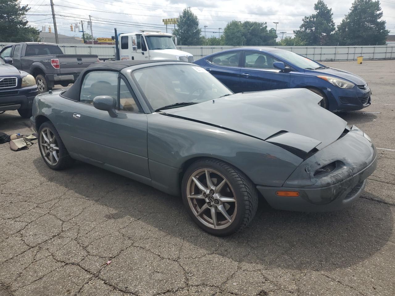 1996 Mazda MX-5 VIN JM1NA3530T0716635 Copart auction photo, front end / side damage thumbnail 4
