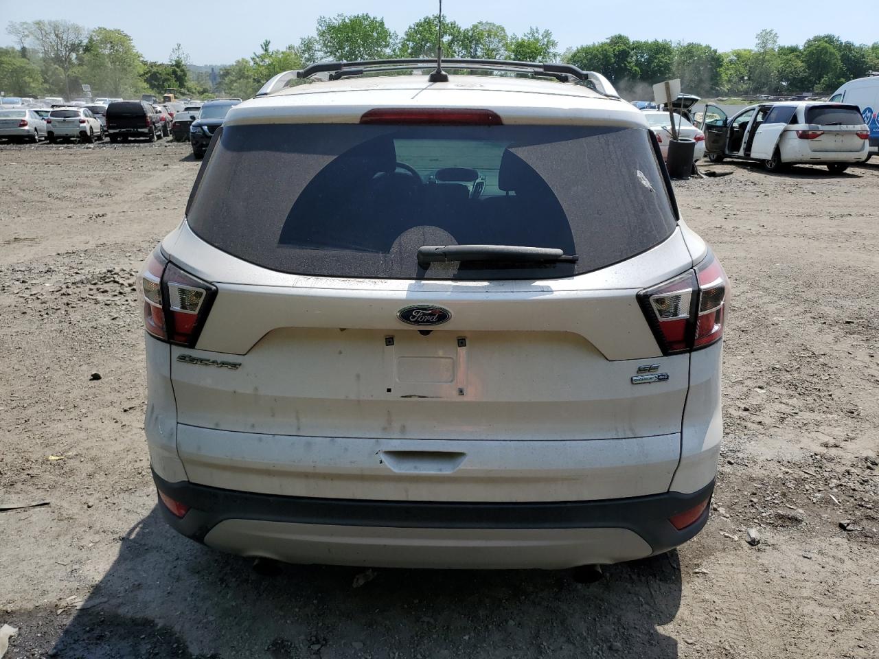 2017 Ford Escape VIN 1FMCU9GD6HUA74571 Copart auction photo, rear end / minor dent/scratches damage thumbnail 6