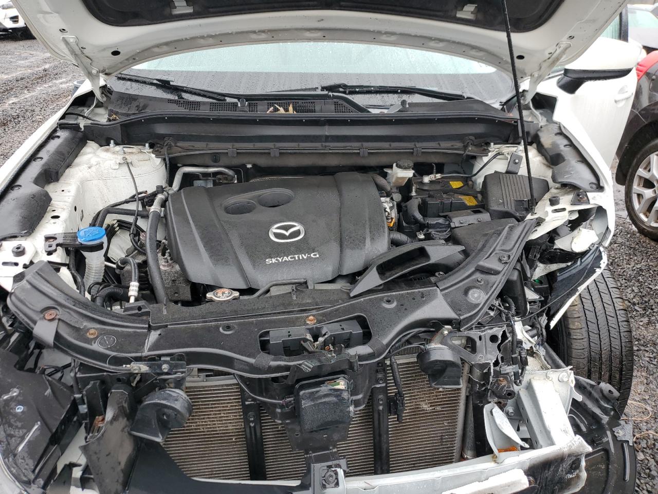 2021 Mazda CX-5 VIN JM3KFBCM8M0493778 Copart auction photo, all over damage thumbnail 12