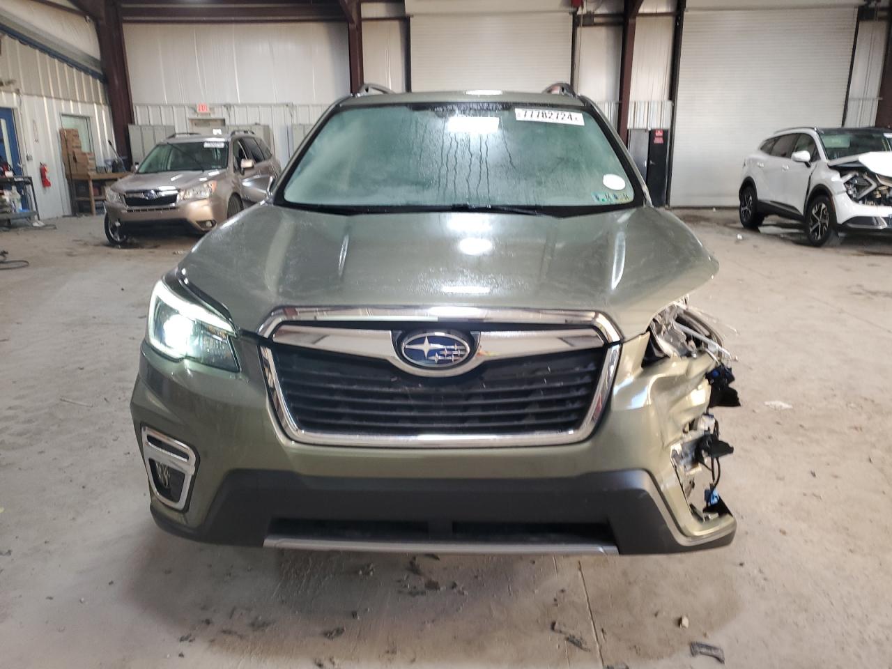 2021 Subaru Forester VIN JF2SKAXC8MH564254 Copart auction photo, side / front end damage thumbnail 5