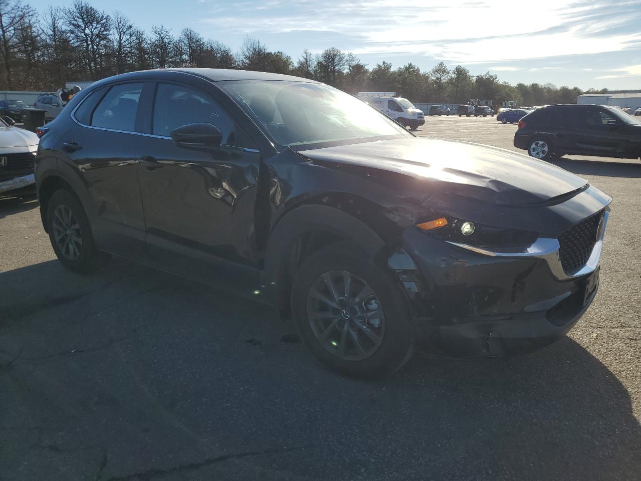 2024 Mazda CX-30 VIN 3MVDMBAM9RM639411 Copart auction photo, front end / side damage thumbnail 4