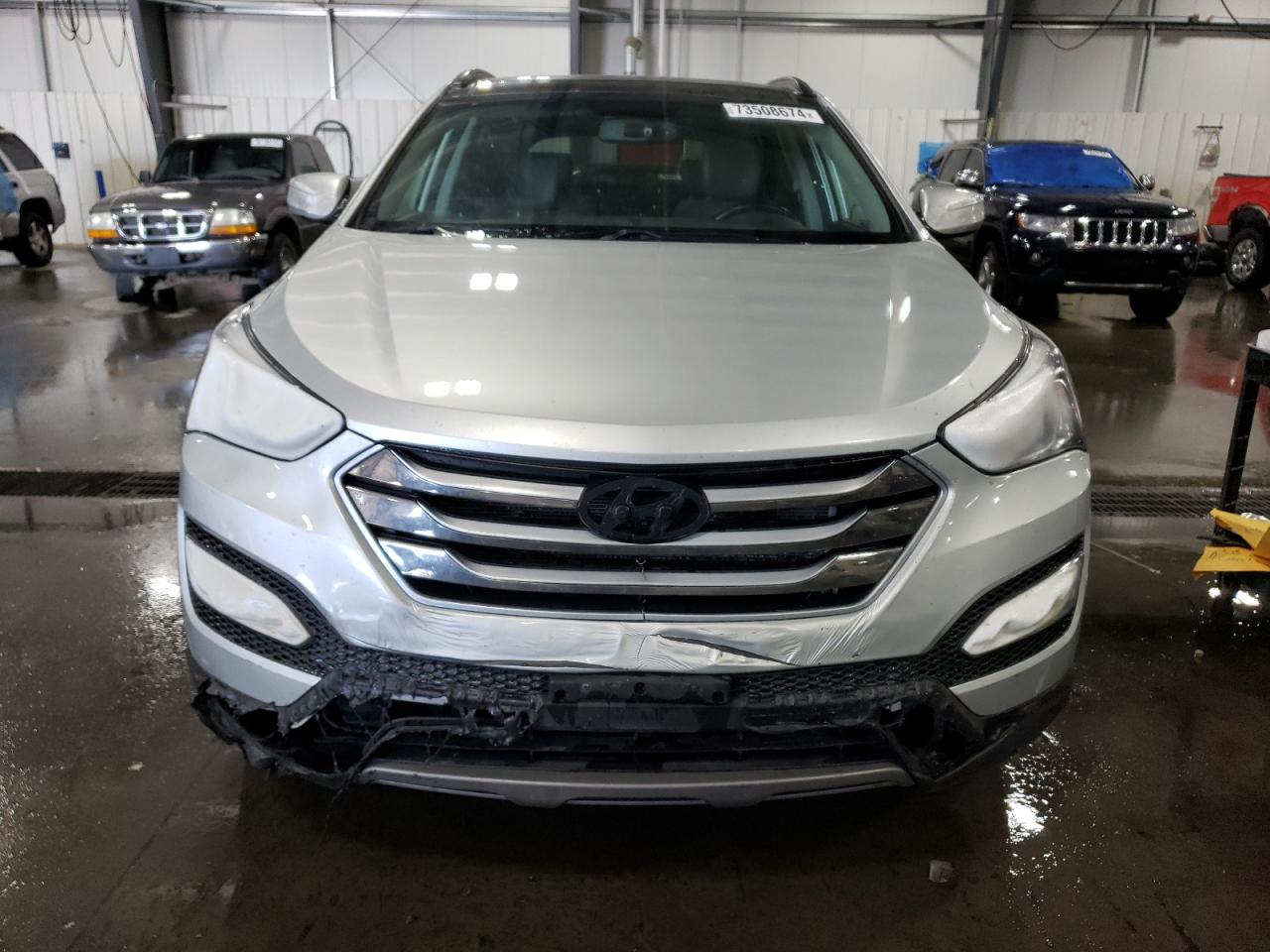 2016 Hyundai Santa Fe VIN 5XYZU3LBXGG367311 Copart auction photo, burn damage thumbnail 5