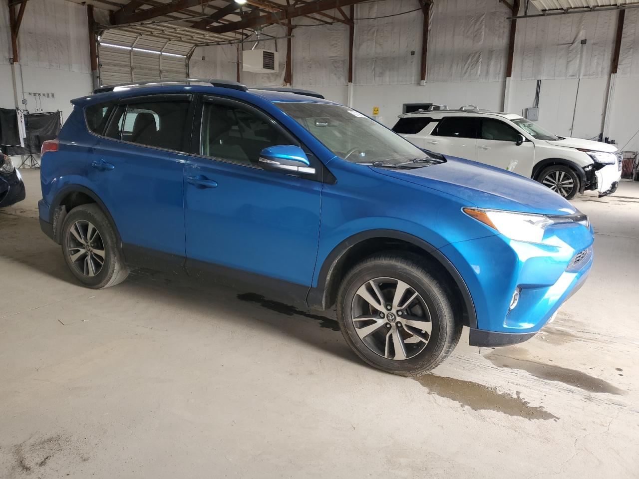 2018 Toyota RAV 4 VIN JTMWFREV7JJ742022 Copart auction photo, water/flood / undercarriage damage thumbnail 4