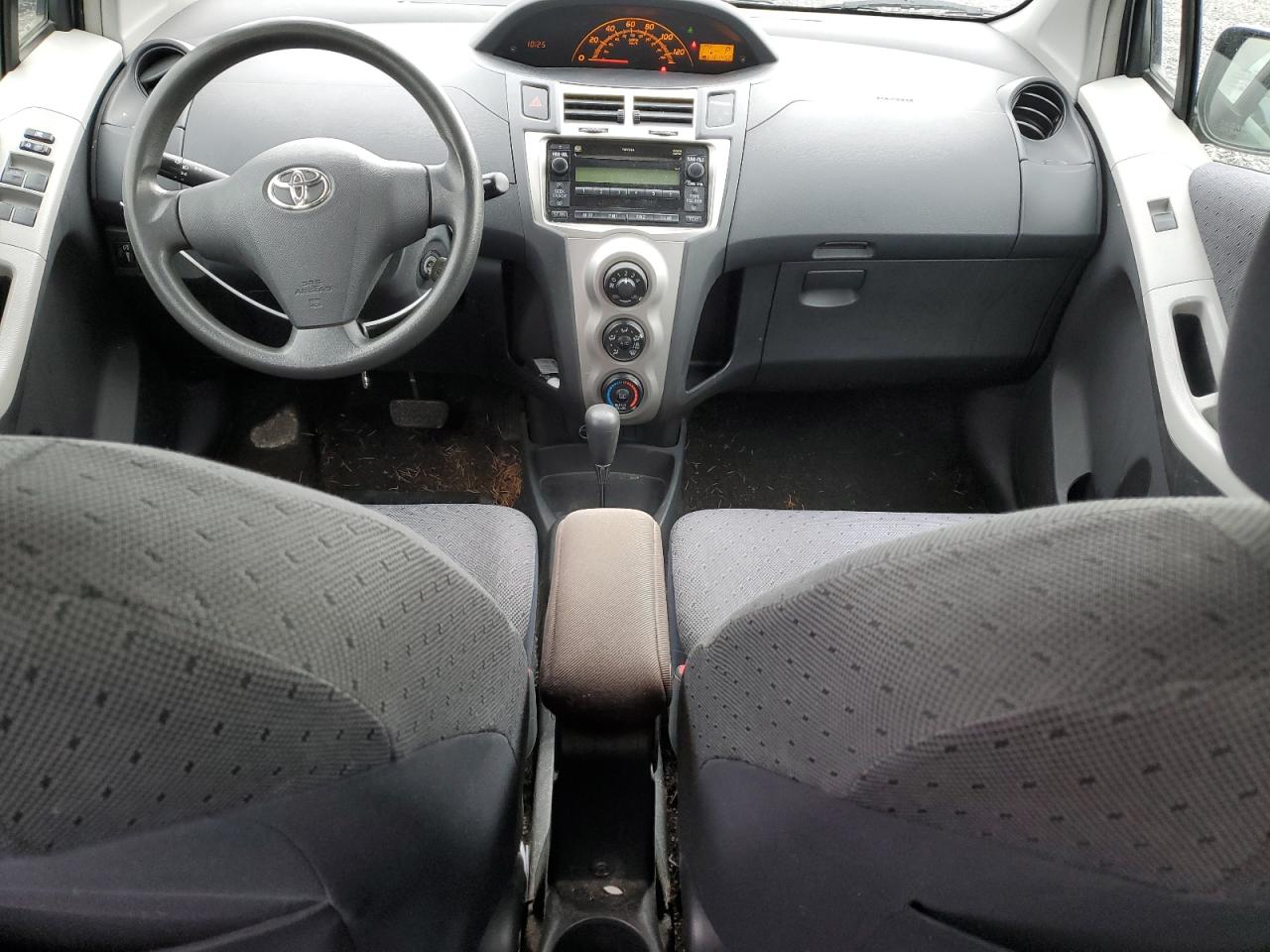 2009 Toyota Yaris VIN JTDKT903095238977 Copart auction photo, side damage thumbnail 8