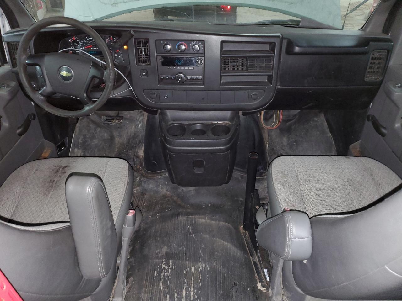 2012 Chevrolet Express VIN 1GCWGFBA0C1192159 Copart auction photo, minor dent/scratches damage thumbnail 8