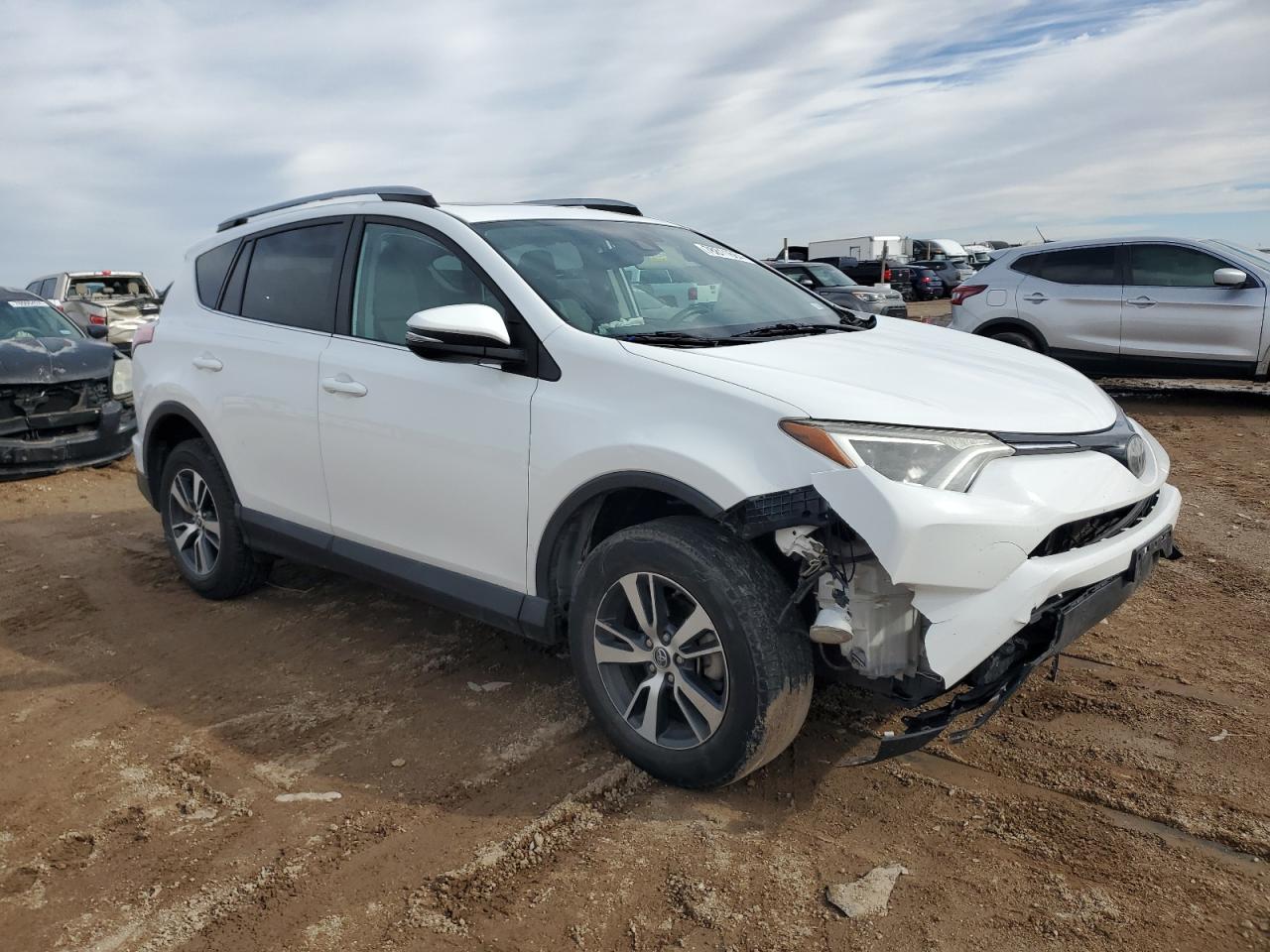 2018 Toyota RAV 4 VIN 2T3WFREV6JW410347 Copart auction photo, front end damage thumbnail 4