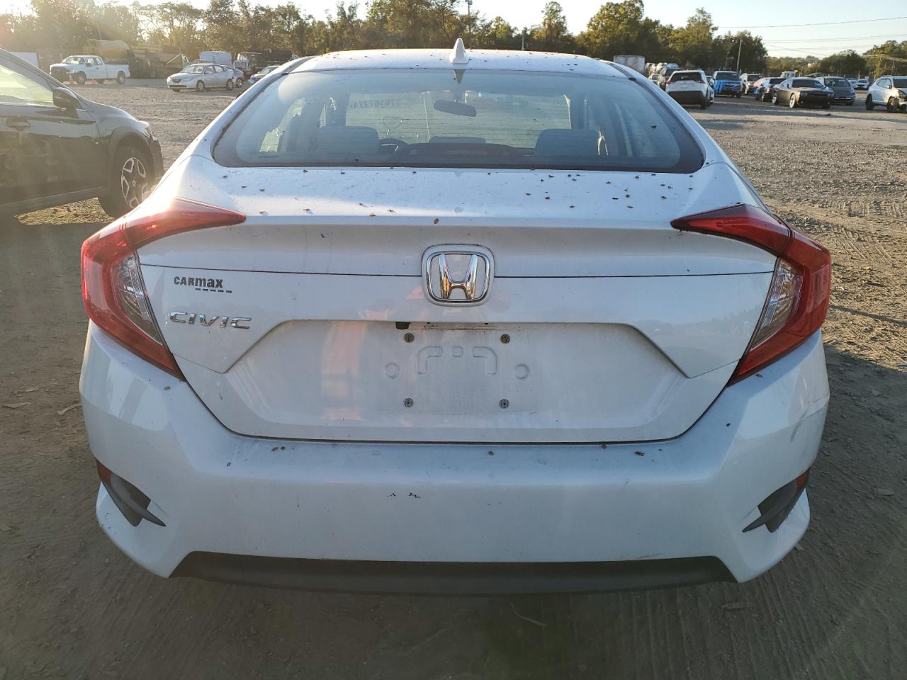 2018 Honda Civic VIN 2HGFC2F79JH575780 Copart auction photo, side / minor dent/scratches damage thumbnail 6