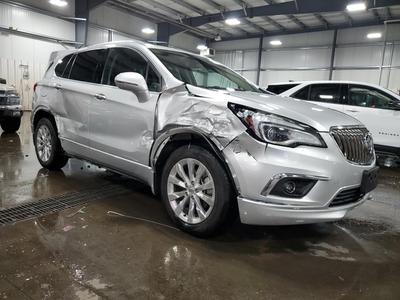 2017 Buick Envision VIN LRBFXBSA9HD047408 Copart auction photo, front end / side damage thumbnail 4