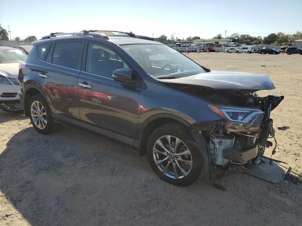 2017 Toyota RAV 4 VIN JTMYFREV0HJ720513 Copart auction photo, front end damage thumbnail 4