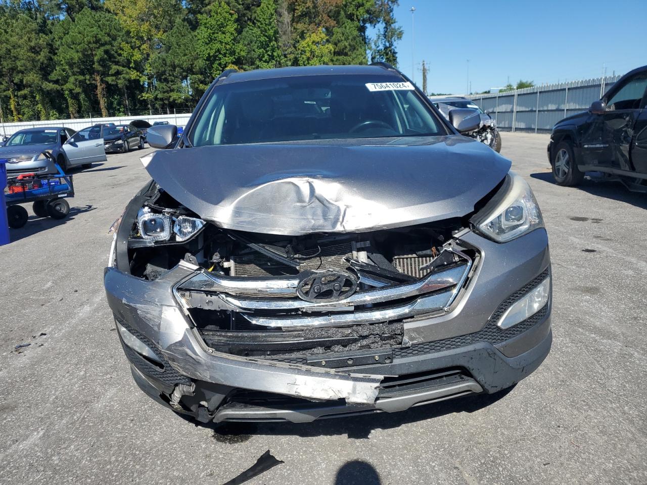 2014 Hyundai Santa Fe VIN 5XYZU3LA8EG128697 Copart auction photo, front end damage thumbnail 5