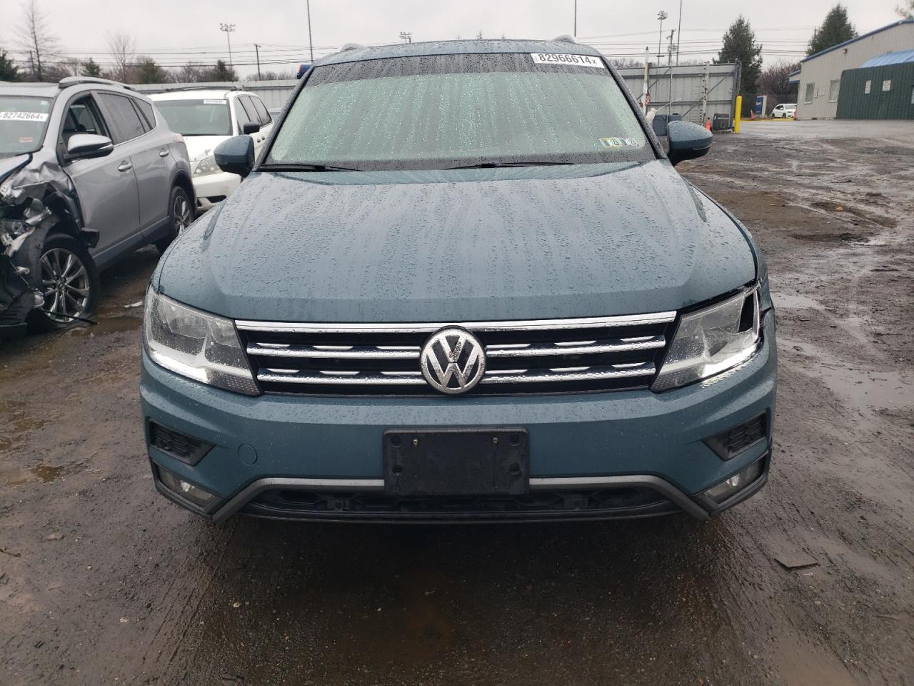 2019 Volkswagen Tiguan VIN 3VV2B7AX5KM152882 Copart auction photo, front end / side damage thumbnail 5