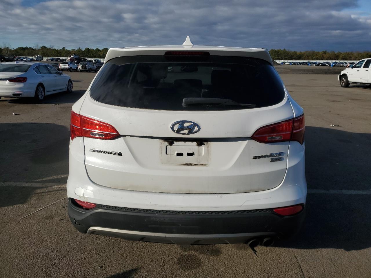 2013 Hyundai Santa Fe VIN 5XYZWDLA5DG065072 Copart auction photo, minor dent/scratches damage thumbnail 6