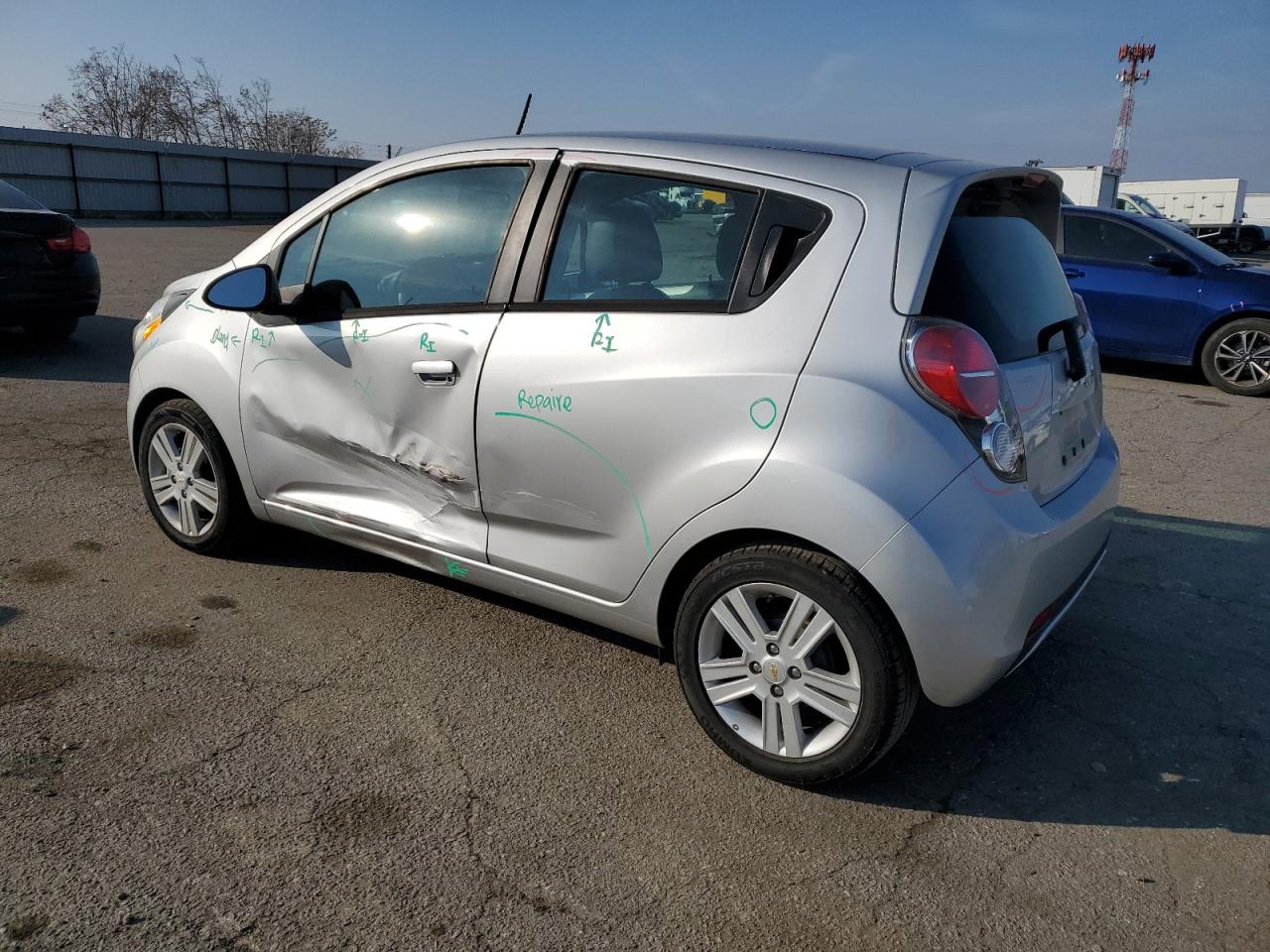 2014 Chevrolet Spark VIN KL8CB6S9XEC543229 Copart auction photo, side damage thumbnail 2