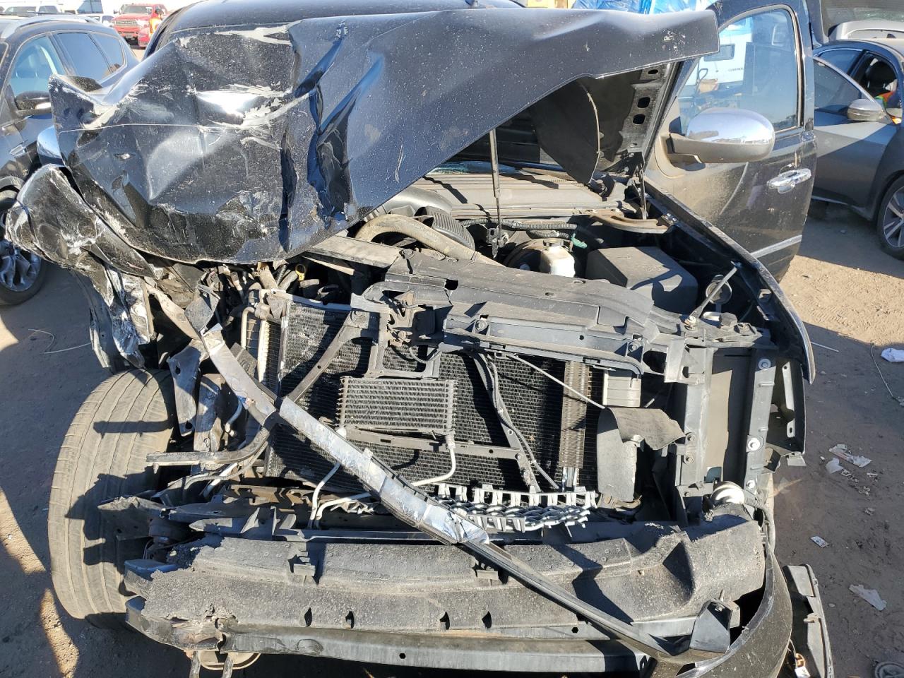 2009 Chevrolet Tahoe VIN 1GNFK33289R129834 Copart auction photo, front end / side damage thumbnail 12