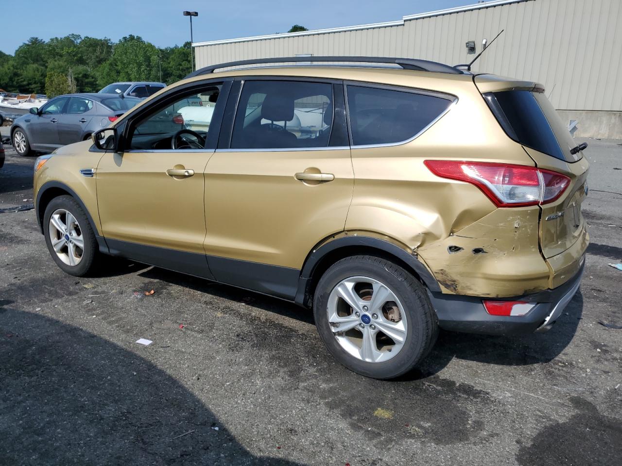 2015 Ford Escape VIN 1FMCU9GX2FUC66027 Copart auction photo, rear end / minor dent/scratches damage thumbnail 2