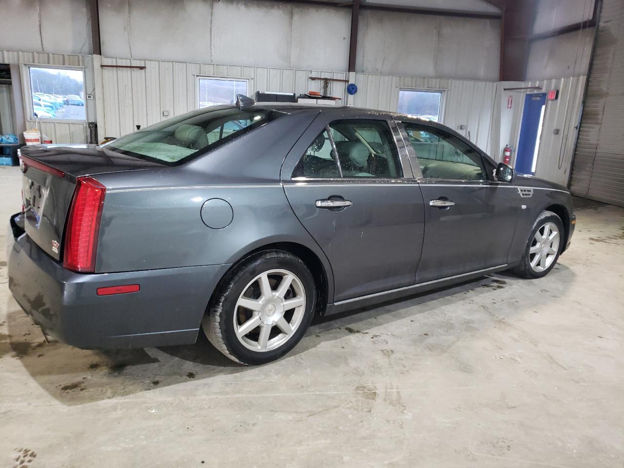 2010 Cadillac STS VIN 1G6DU6EV5A0113671 Copart auction photo, rear end damage thumbnail 3