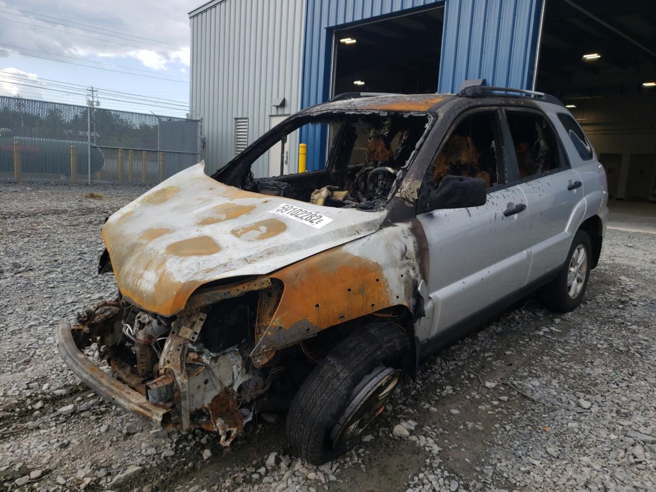 2009 KIA Sportage VIN KNDJE723997602549 Copart auction photo, burn damage thumbnail 2
