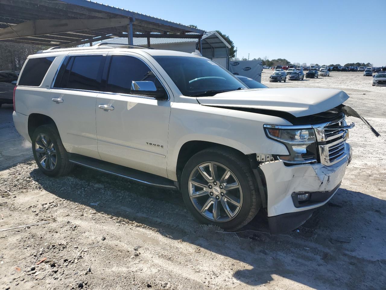 2015 Chevrolet Tahoe VIN 1GNSCCKC5FR600193 Copart auction photo, front end / side damage thumbnail 4
