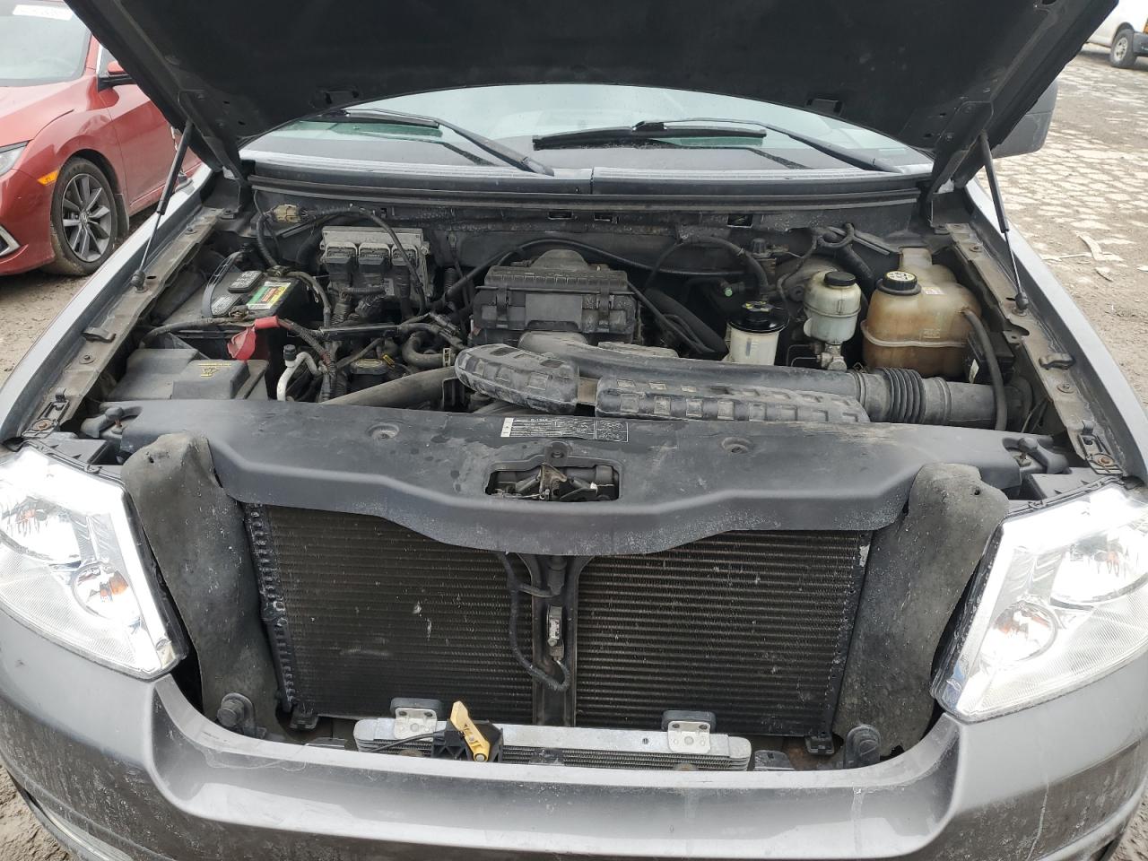 2005 Ford F-150 VIN 1FTPX14535FA14940 Copart auction photo, all over / minor dent/scratches damage thumbnail 12