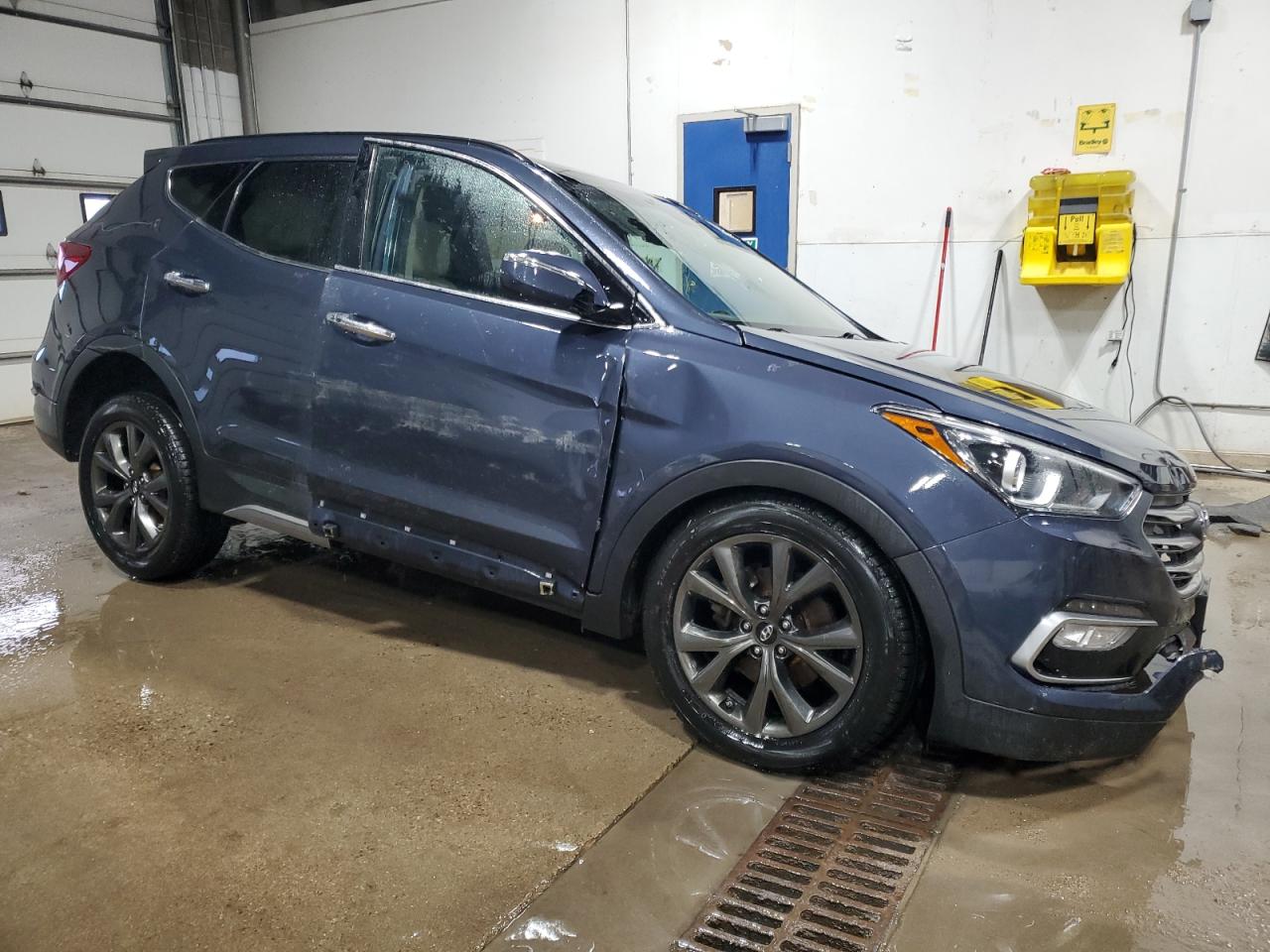 2017 Hyundai Santa Fe VIN 5XYZWDLA2HG486799 Copart auction photo, all over damage thumbnail 4