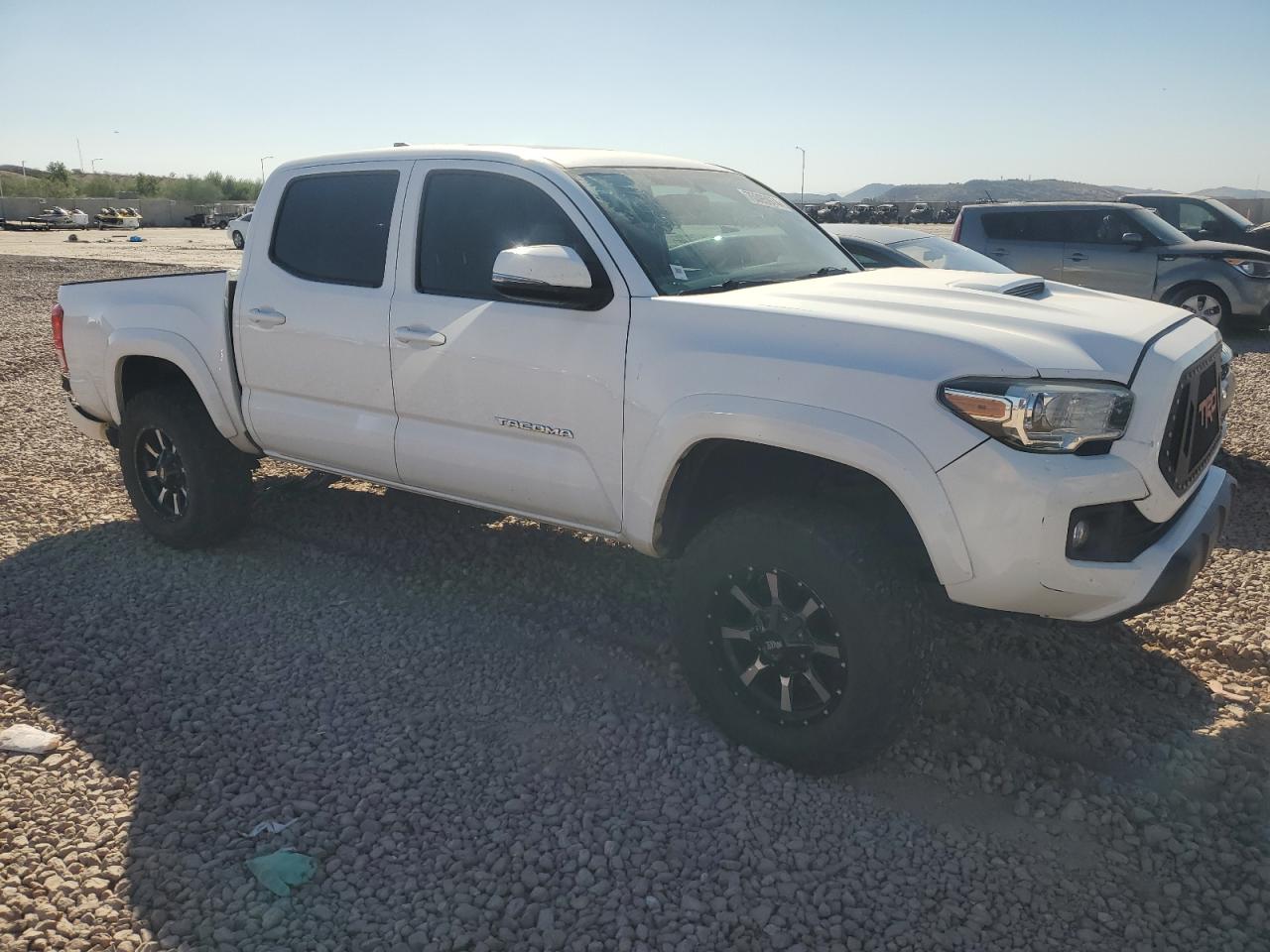 2016 Toyota Tacoma VIN 3TMAZ5CN6GM013163 Copart auction photo, rear end damage thumbnail 4
