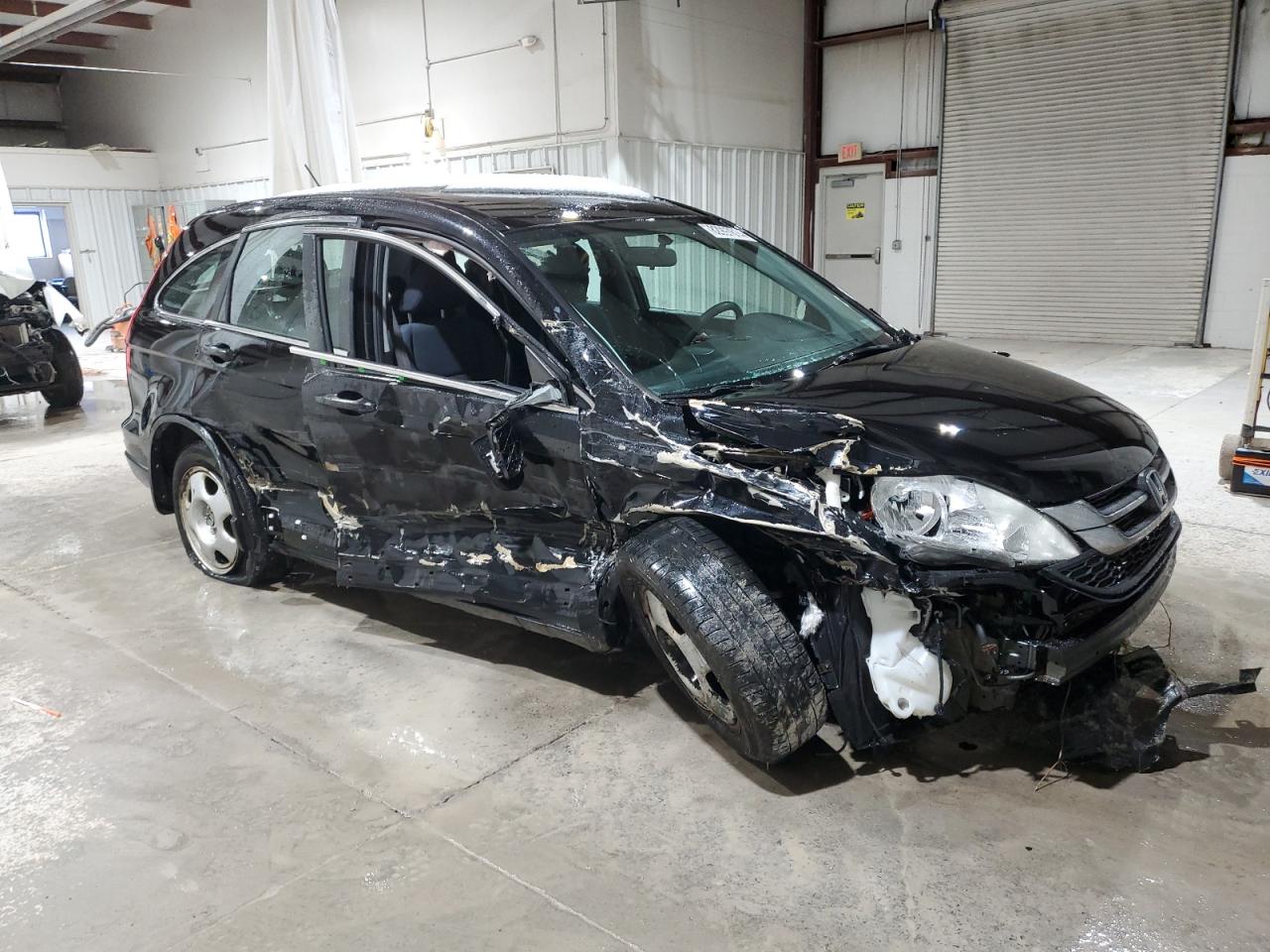 2010 Honda CR-V VIN 5J6RE4H31AL054481 Copart auction photo, front end / side damage thumbnail 4