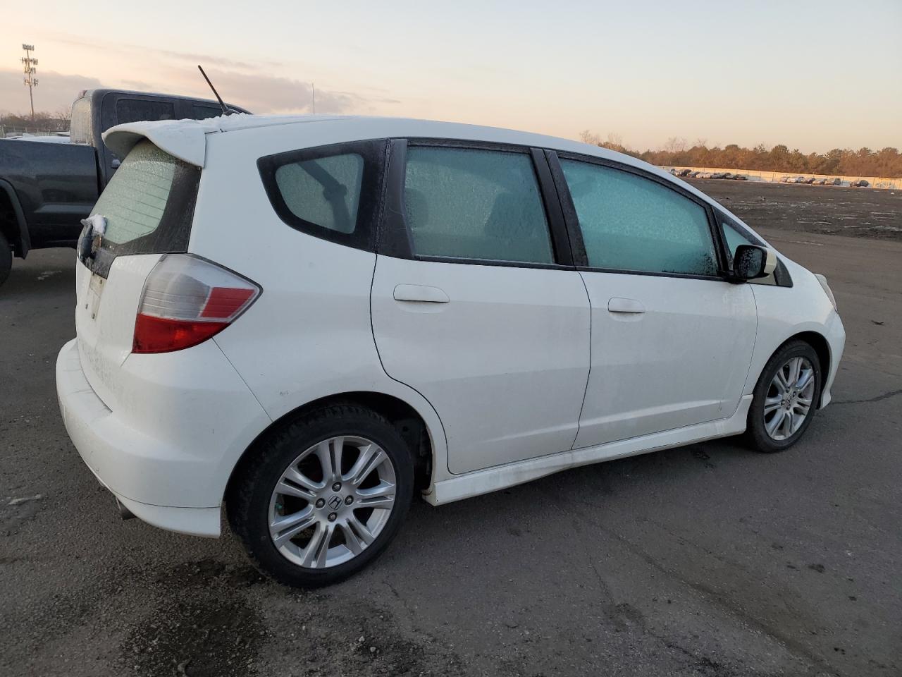 2011 Honda Fit VIN JHMGE8H56BS000038 Copart auction photo, side damage thumbnail 3