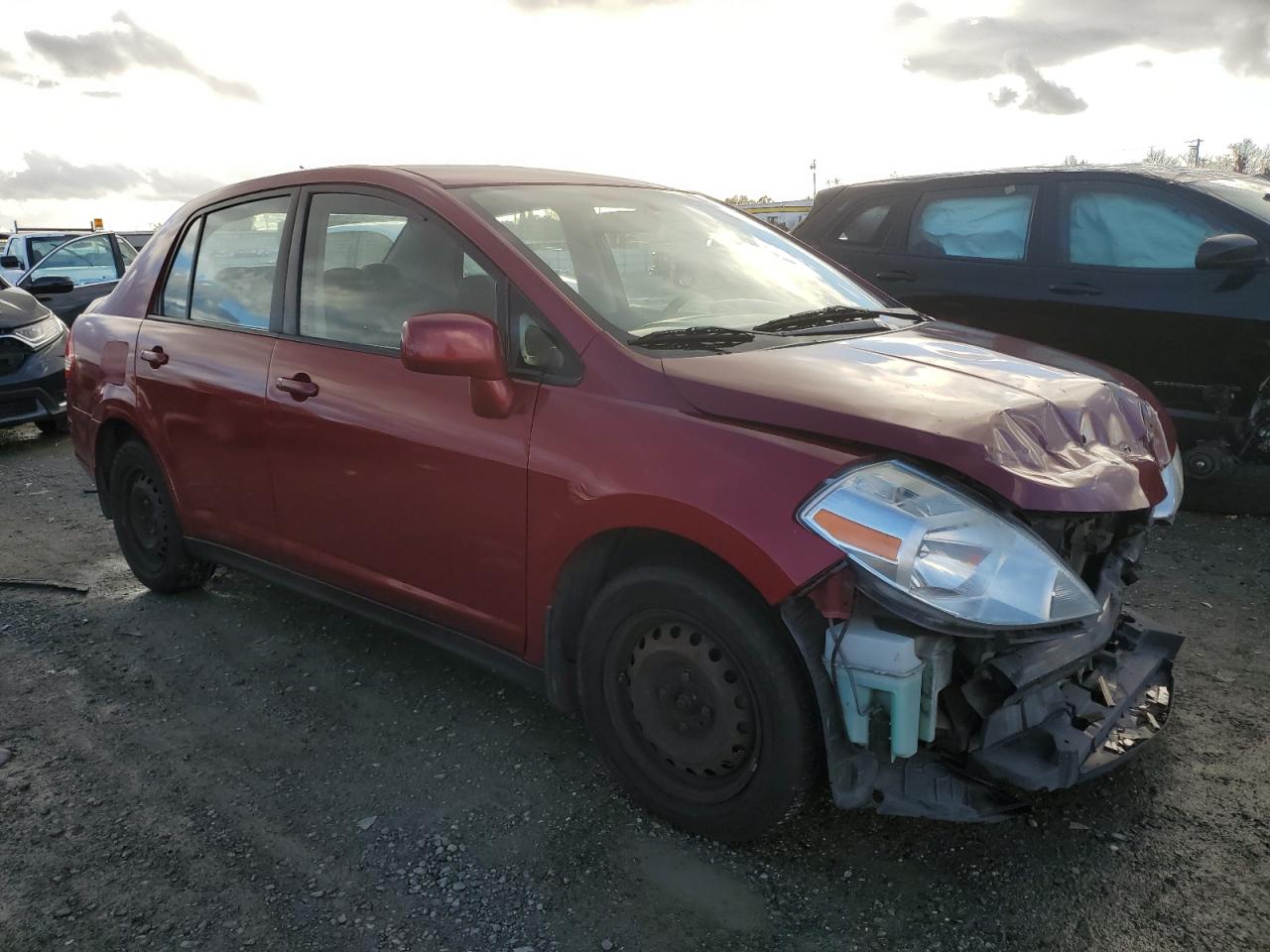 2010 Nissan Versa VIN 3N1BC1AP7AL422548 Copart auction photo, front end damage thumbnail 4