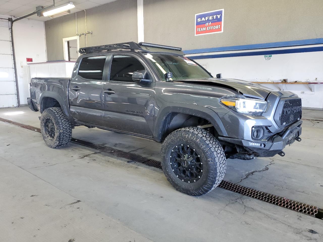 2021 Toyota Tacoma VIN 5TFCZ5AN4MX248548 Copart auction photo, all over damage thumbnail 4