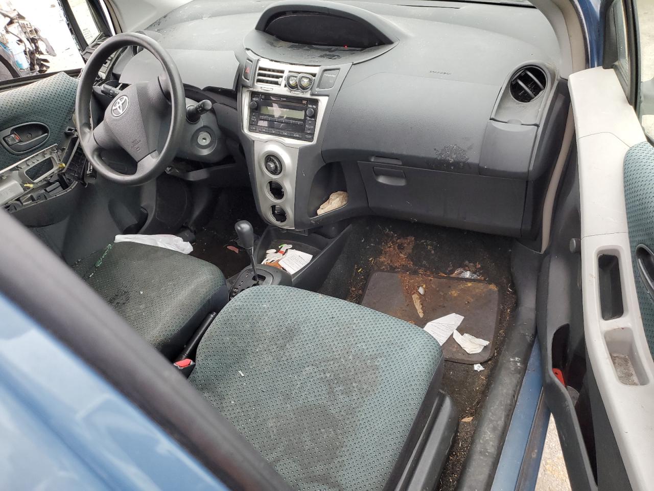 2008 Toyota Yaris VIN JTDJT923785197139 Copart auction photo, side / front end damage thumbnail 8