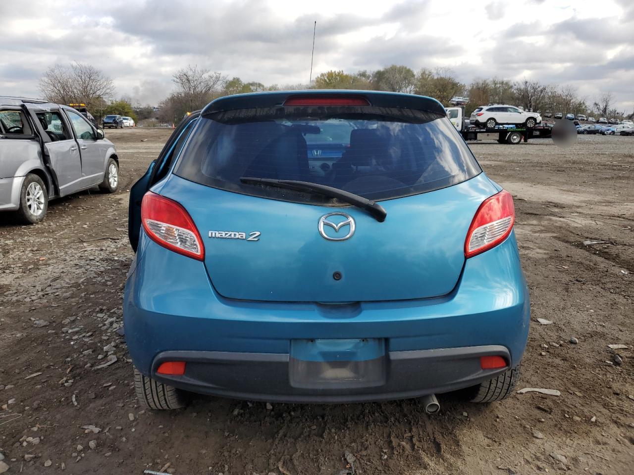 2012 Mazda 2 VIN JM1DE1LZ6C0151299 Copart auction photo, front end / minor dent/scratches damage thumbnail 6