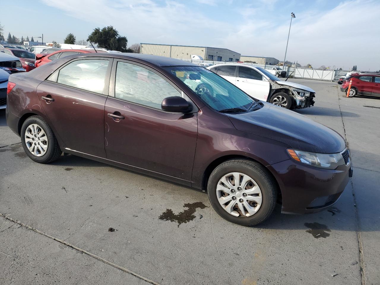 2011 KIA Forte VIN KNAFU4A25B5317491 Copart auction photo, vandalism / all over damage thumbnail 4
