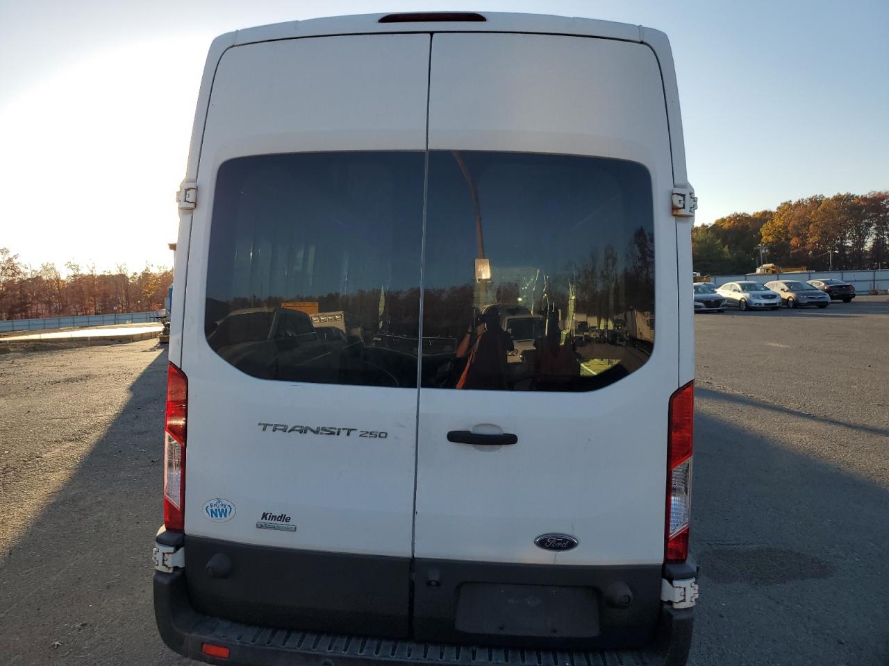 2016 Ford Transit VIN 1FTYR3XG7GKA35565 Copart auction photo, side damage thumbnail 6