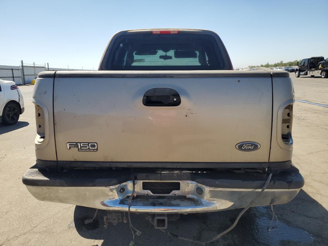 2003 Ford F-150 VIN 1FTRW08LX3KC30187 Copart auction photo, vandalism damage thumbnail 6