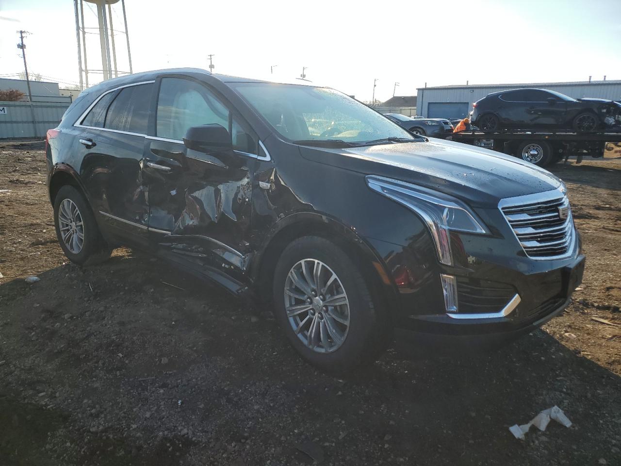 2019 Cadillac XT5 VIN 1GYKNDRS2KZ194769 Copart auction photo, side damage thumbnail 4