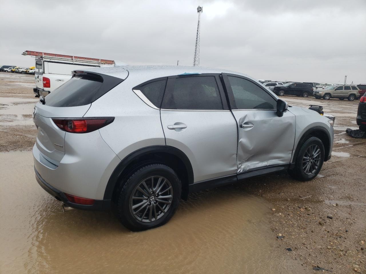 2020 Mazda CX-5 VIN JM3KFACM1L0790125 Copart auction photo, side damage thumbnail 3