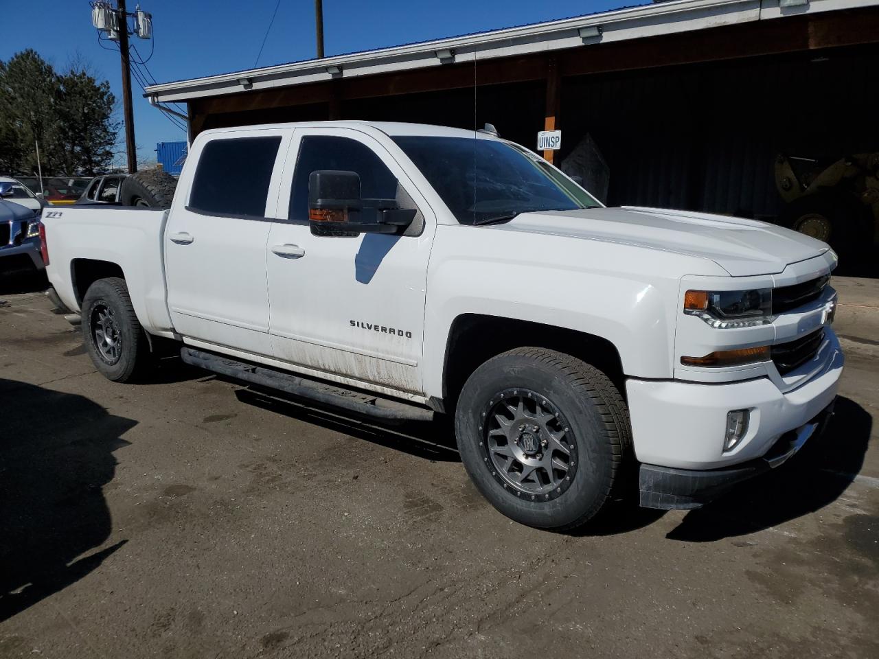 2018 Chevrolet Silverado VIN 3GCUKREC1JG107185 Copart auction photo, rear end damage thumbnail 4