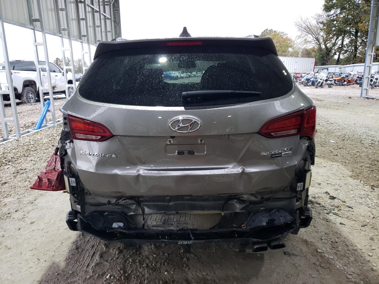 2017 Hyundai Santa Fe VIN 5XYZWDLA7HG446007 Copart auction photo, rear end / minor dent/scratches damage thumbnail 6