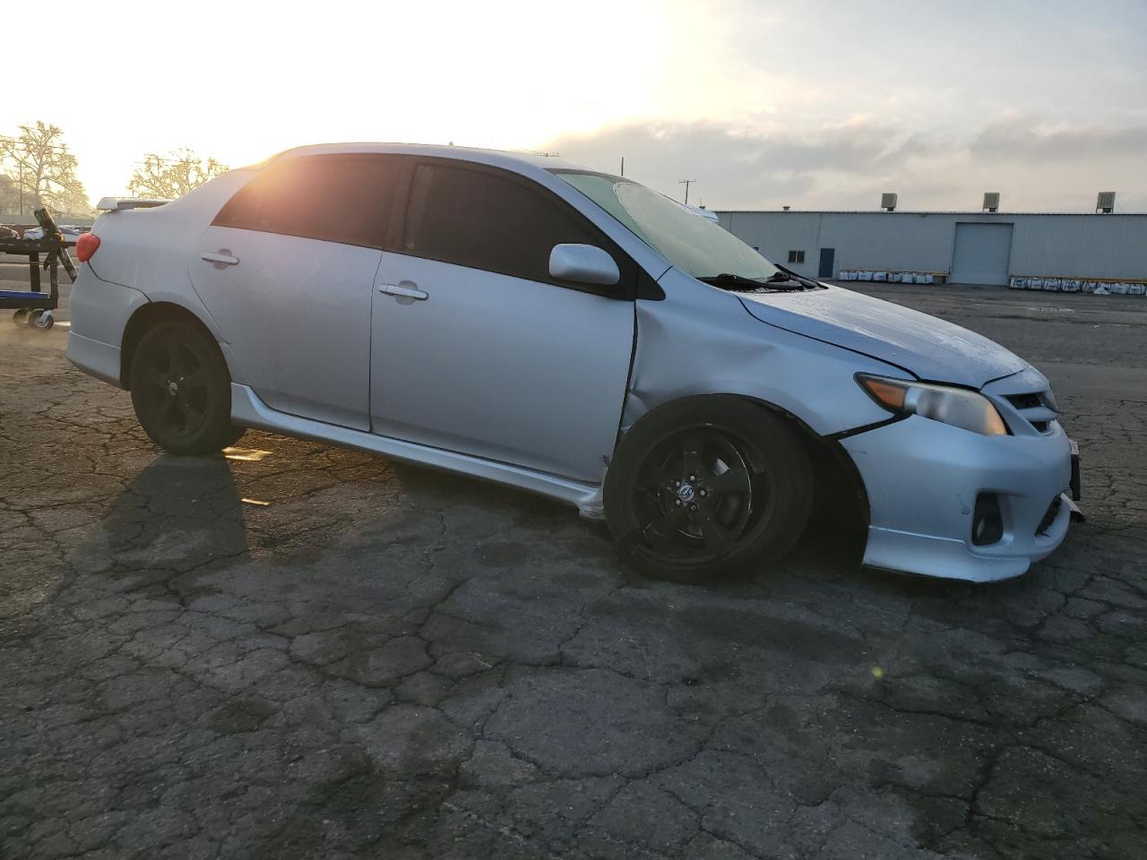 2012 Toyota Corolla VIN 2T1BU4EE2CC788461 Copart auction photo, side / front end damage thumbnail 4