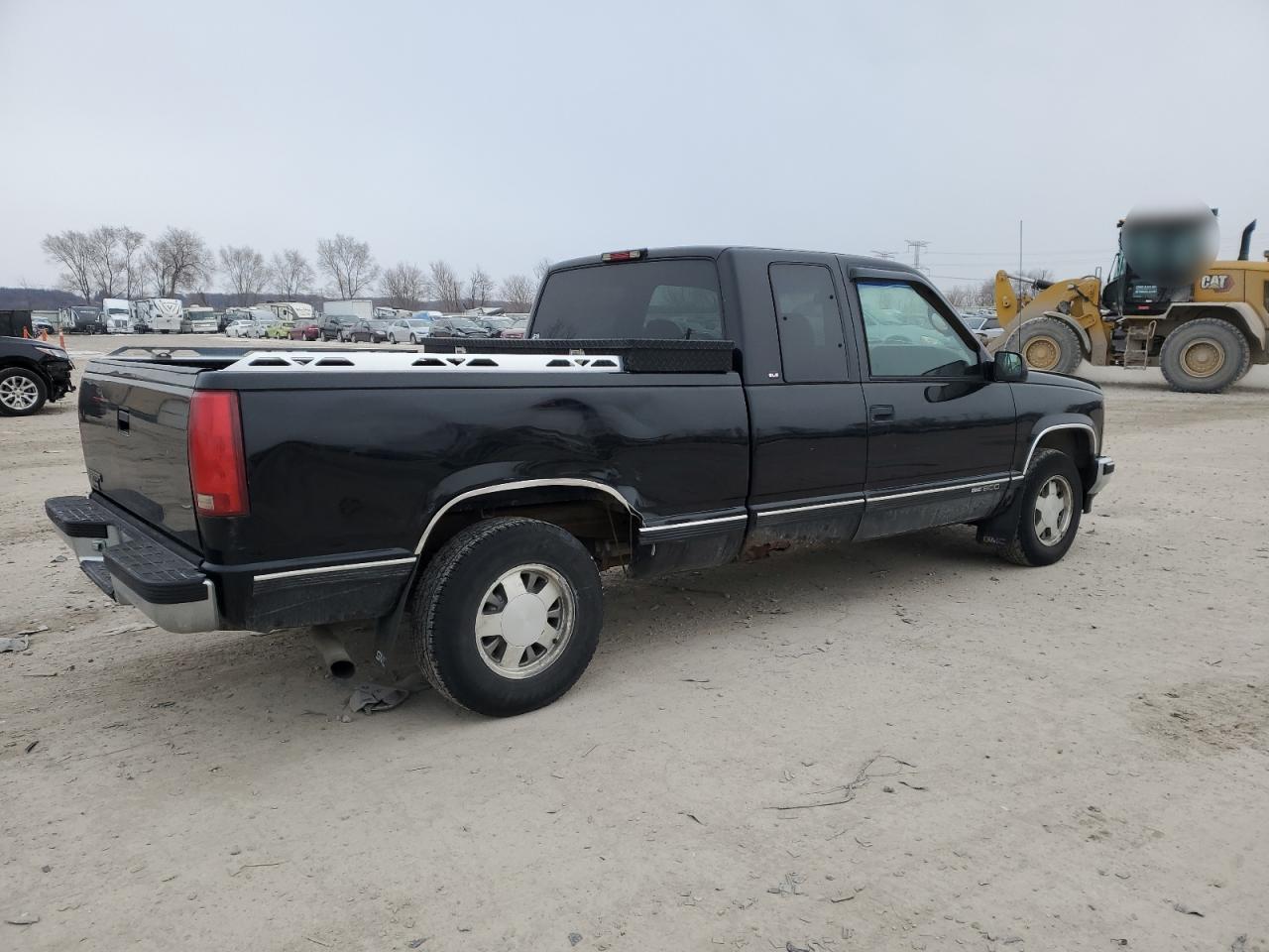 1997 GMC Sierra VIN 1GTEC19M0VE552763 Copart auction photo, side damage thumbnail 3
