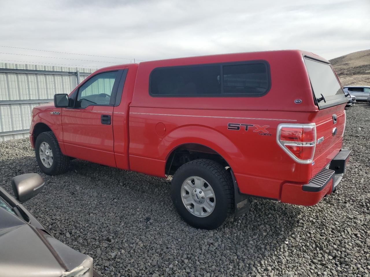 2010 Ford F-150 VIN 1FTMF1E83AKE24251 Copart auction photo, side / rear end damage thumbnail 2