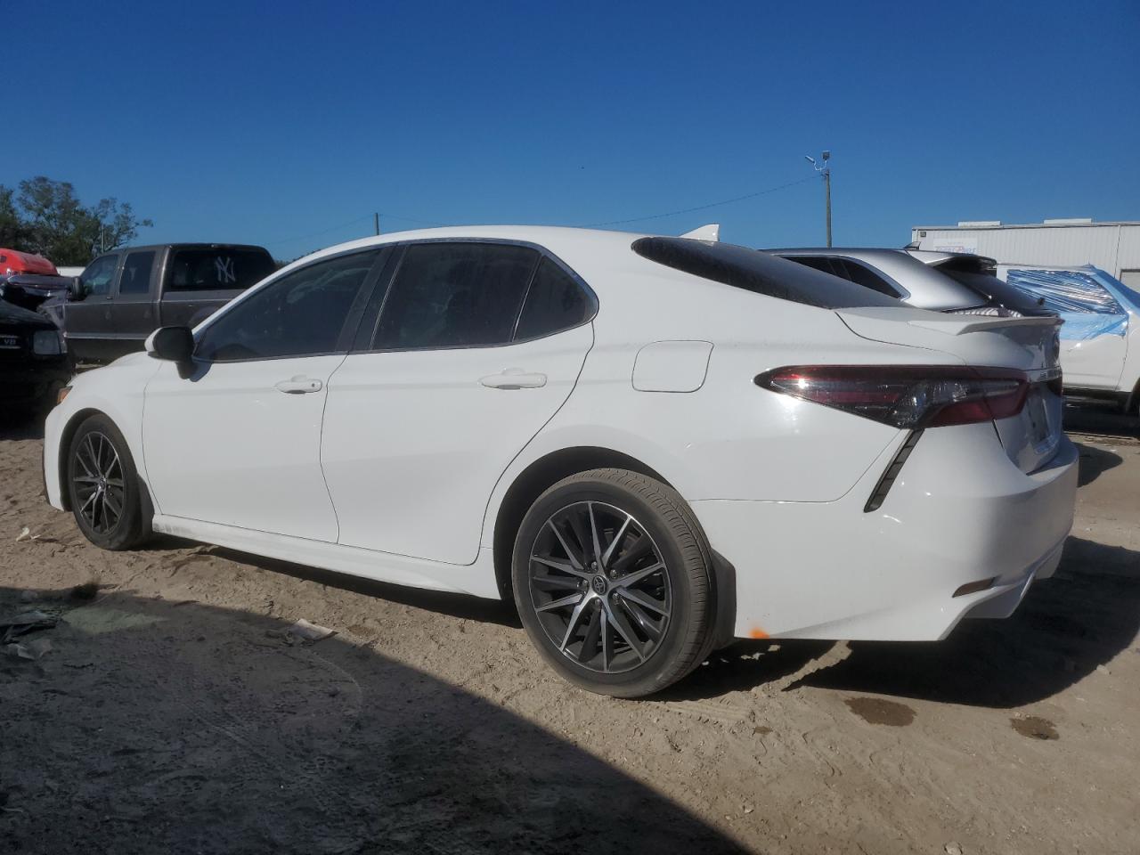 2022 Toyota Camry VIN 4T1T11AK0NU640348 Copart auction photo, side / front end damage thumbnail 2