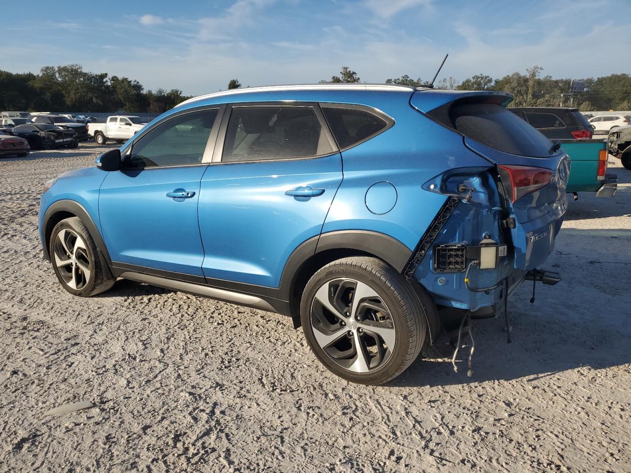 2016 Hyundai Tucson VIN KM8J33A2XGU230138 Copart auction photo, rear end damage thumbnail 2