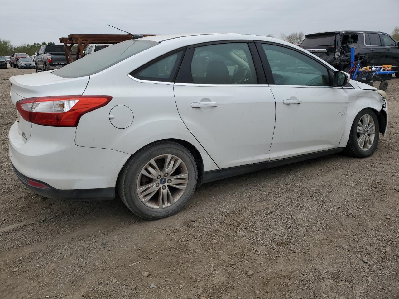 2012 Ford Focus VIN 1FAHP3H21CL424737 Copart auction photo, front end / minor dent/scratches damage thumbnail 3
