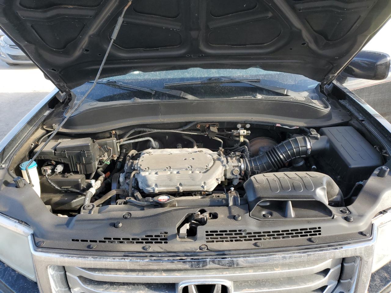 2012 Honda Ridgeline VIN 5FPYK1F58CB454158 Copart auction photo, minor dent/scratches damage thumbnail 11
