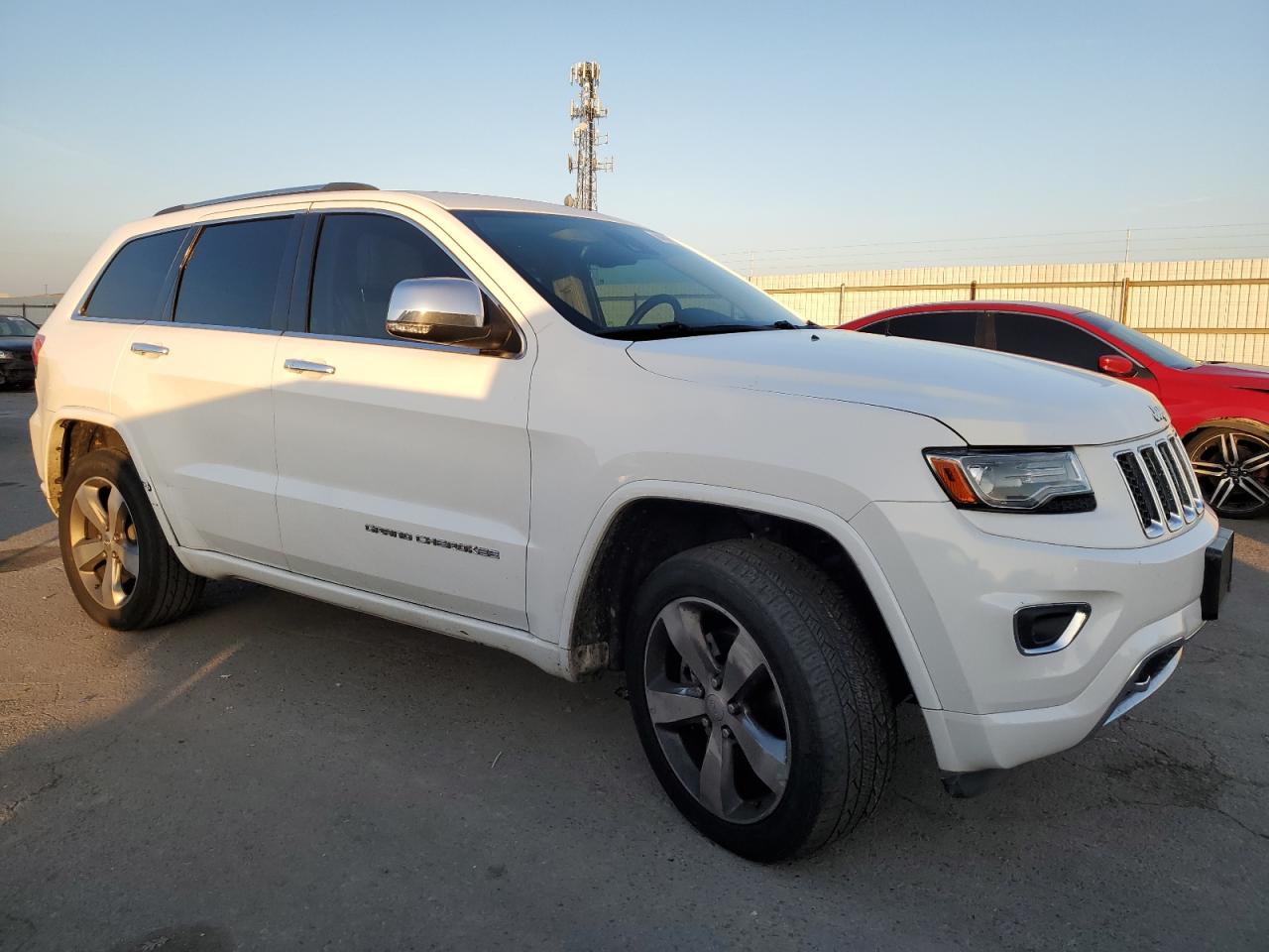 2014 Jeep Grand Cherokee VIN 1C4RJFCM0EC299937 Copart auction photo, front end / undercarriage damage thumbnail 4