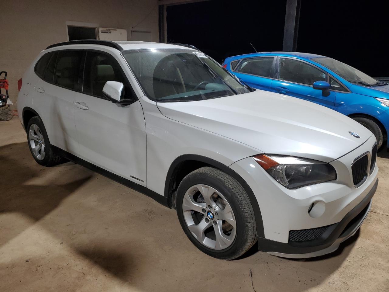 2015 BMW X1 VIN WBAVM1C57FV316575 Copart auction photo, side damage thumbnail 4