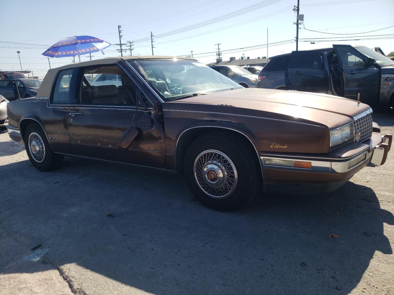 1988 Cadillac Eldorado VIN 1G6EL115XJU611177 Copart auction photo, side / front end damage thumbnail 4