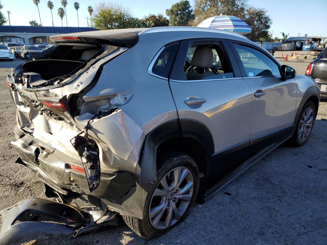 2023 Mazda CX-30 VIN 3MVDMBCM3PM573318 Copart auction photo, rear end / minor dent/scratches damage thumbnail 3